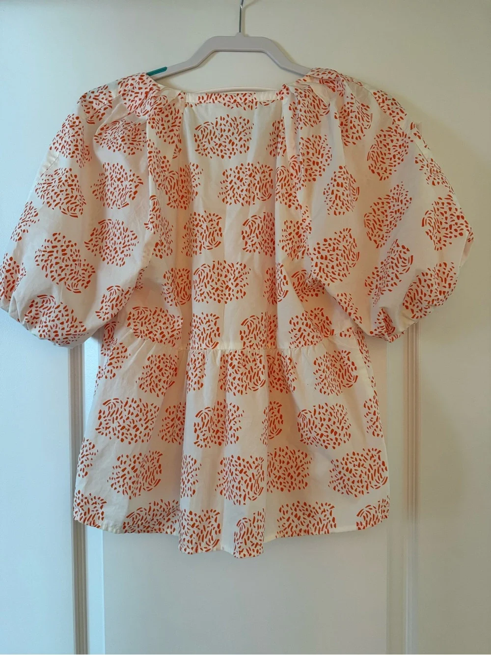 Anthropologie Cream Peasant Top with Orange Print